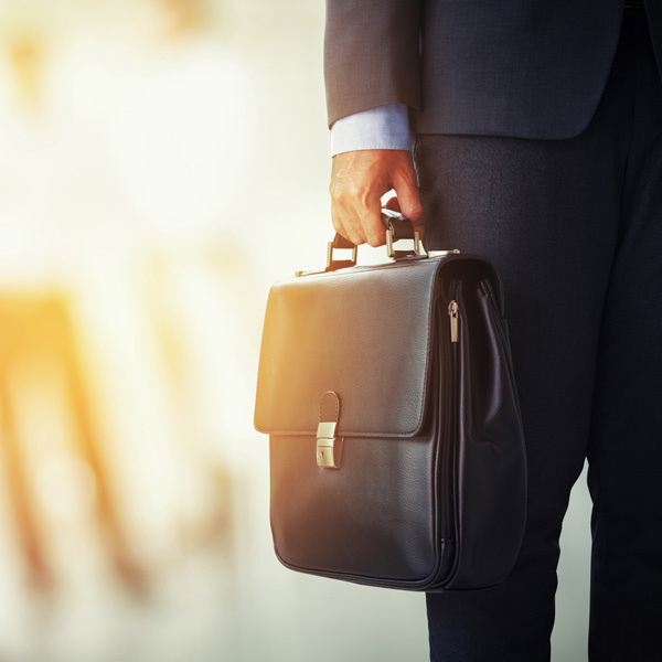 man holding briefcase